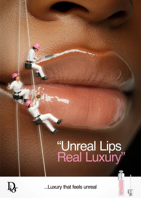Surreal lip beauty creative with miniature workers